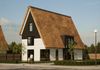 Klassieke woning met rietenkap meerkerk