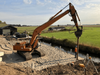 houten palen met betonkop