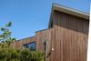 houten huis met sedum schuin dak arkel