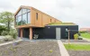 Houtskeletbouwhuismettuin